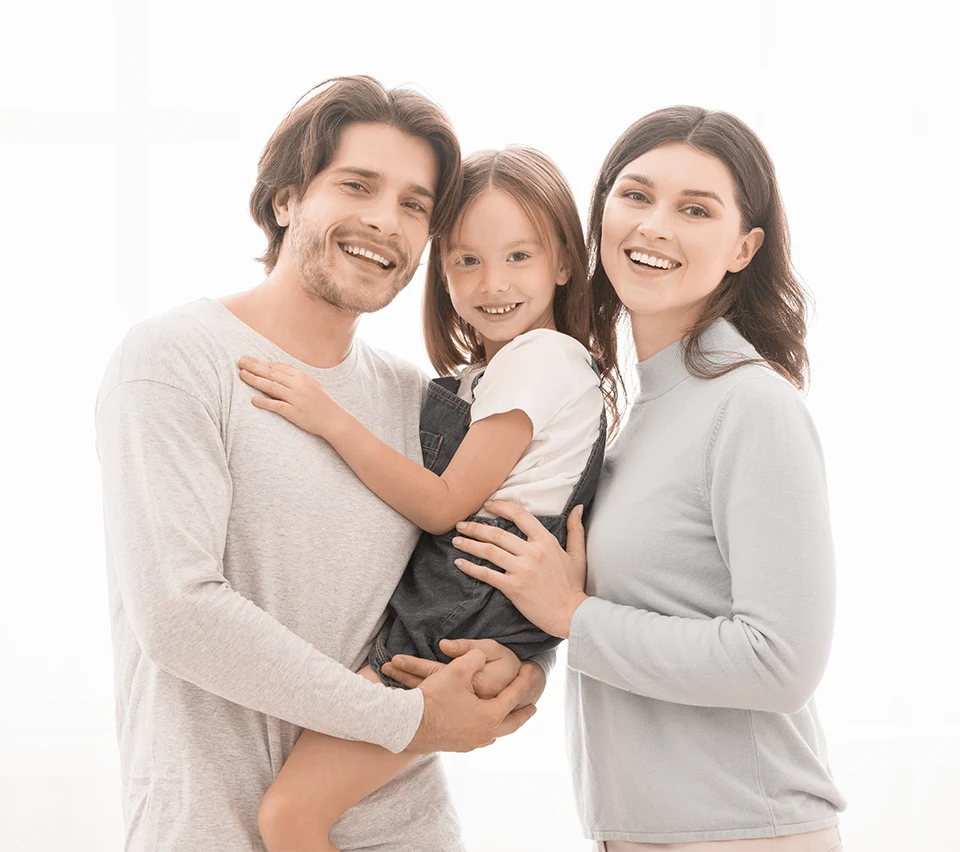 Happy family with great teeth provided by Smiles Dental in Norfolk, NE